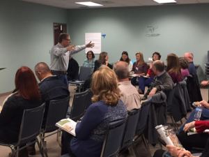 Alan teaching his Bible study group